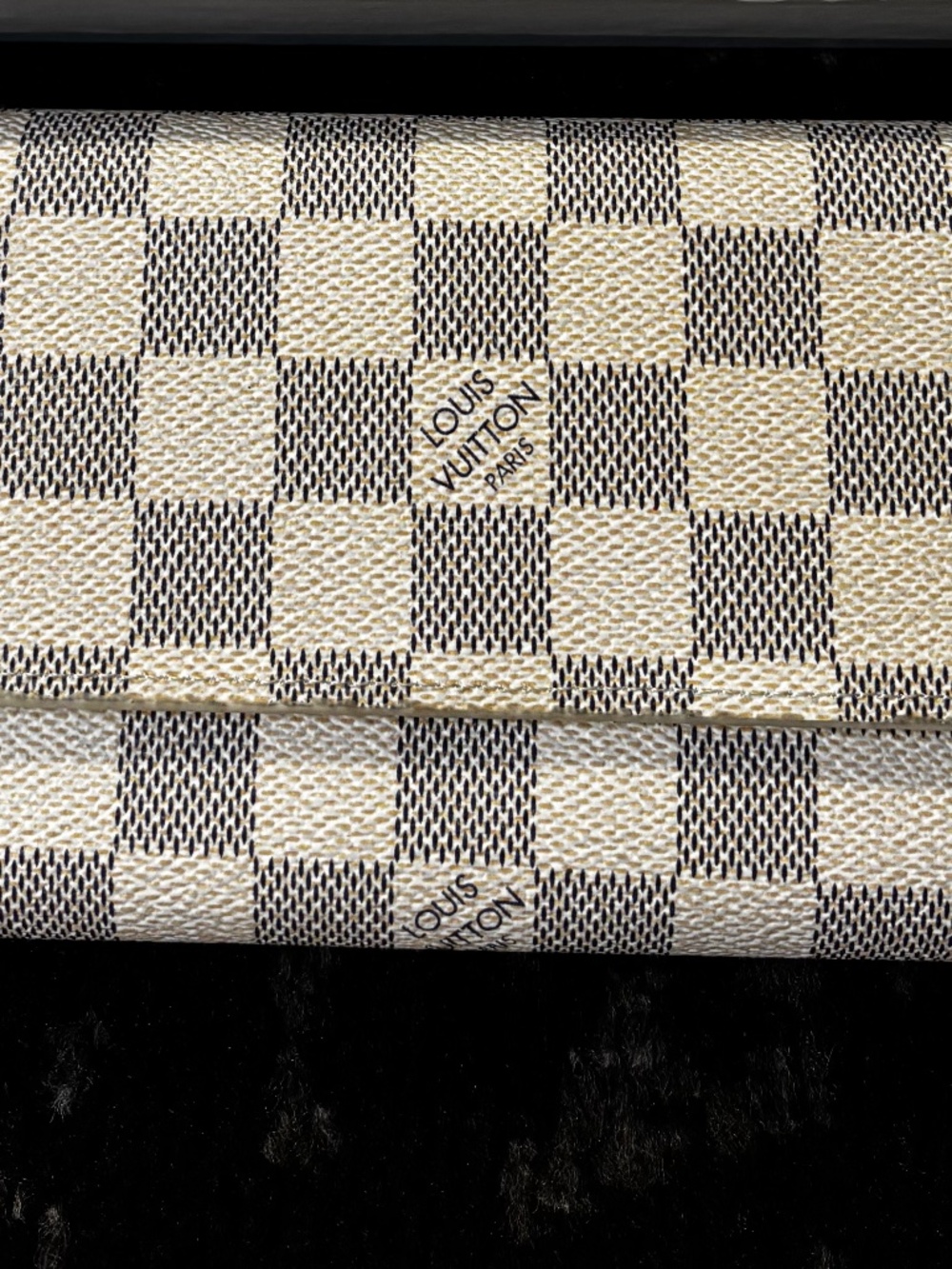 Cream and blue checkered wallet